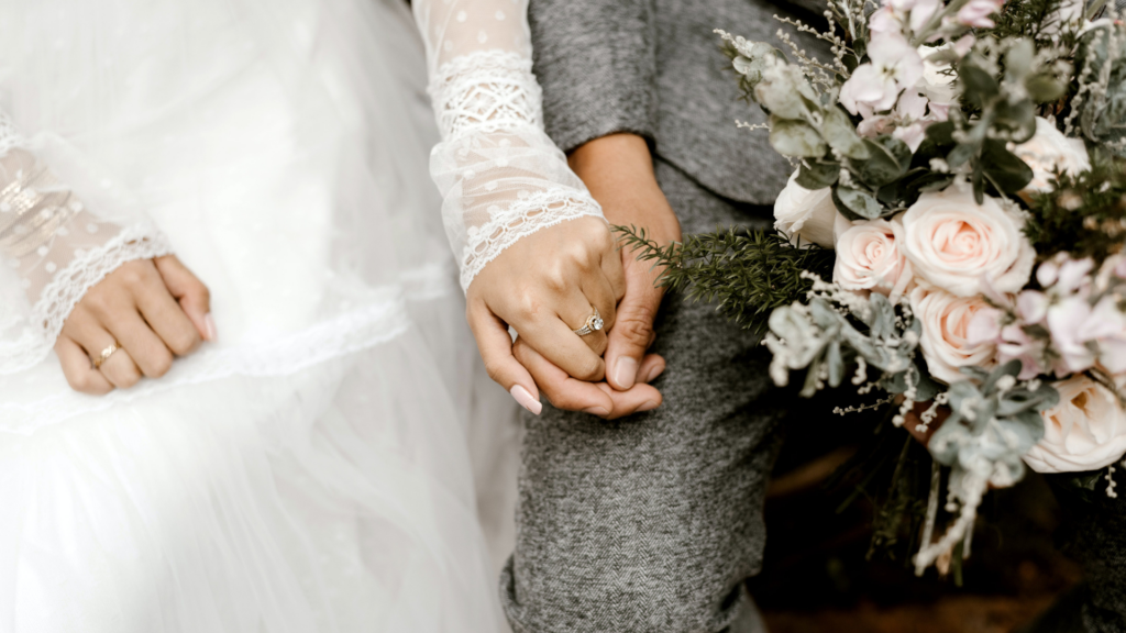 Couple holding hands
